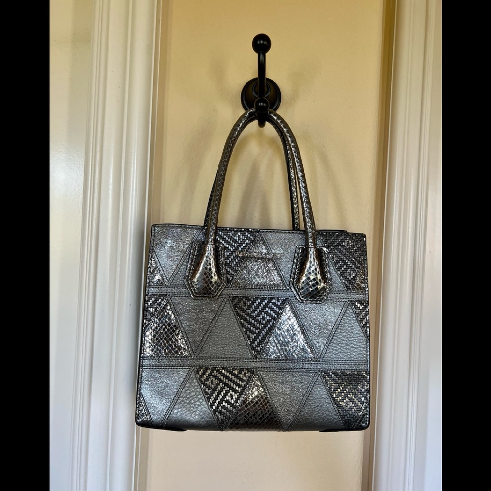 Never used Michael Kors metallic gunmetal purse.